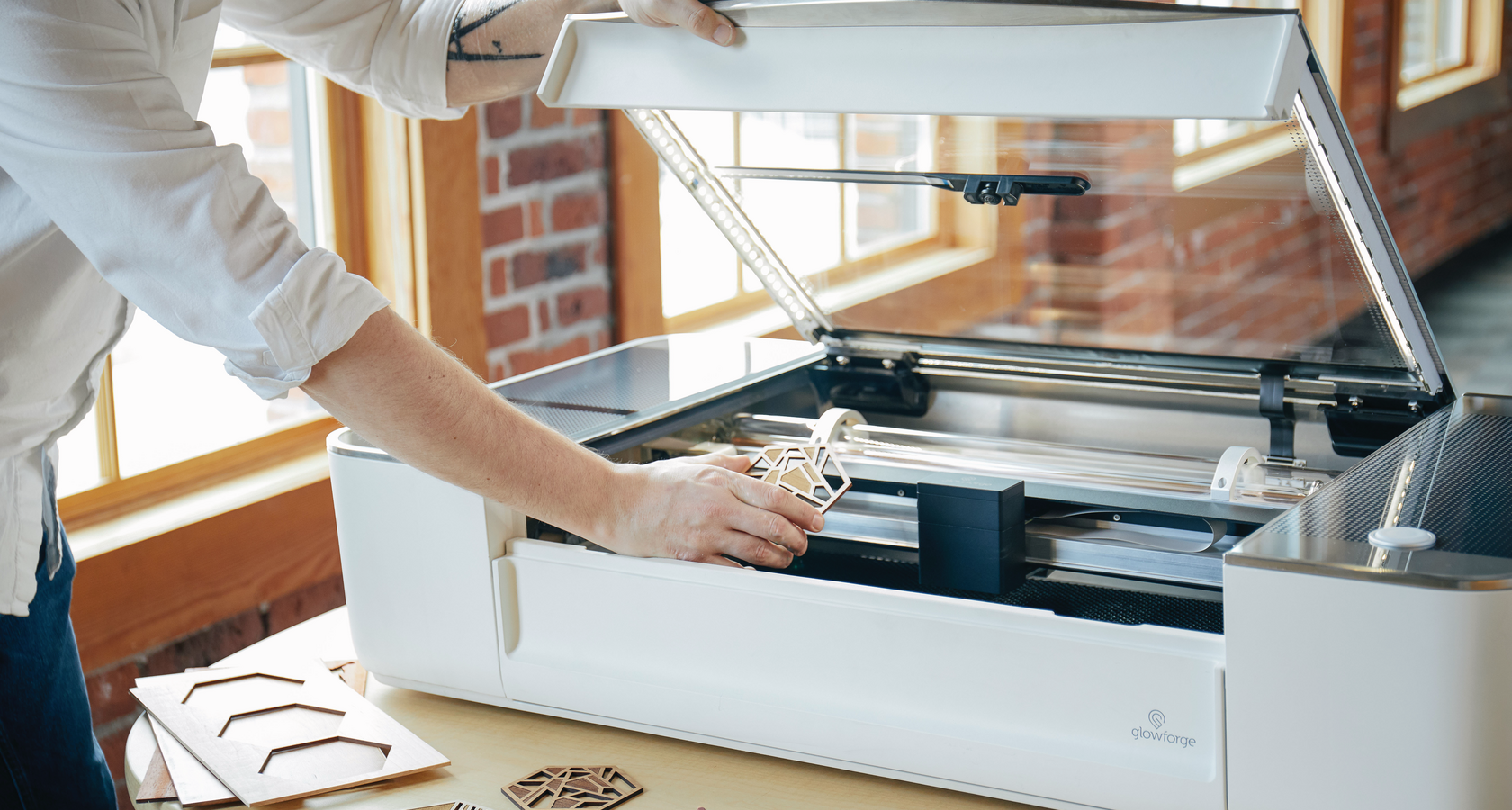 Glowforge laser cutter being used